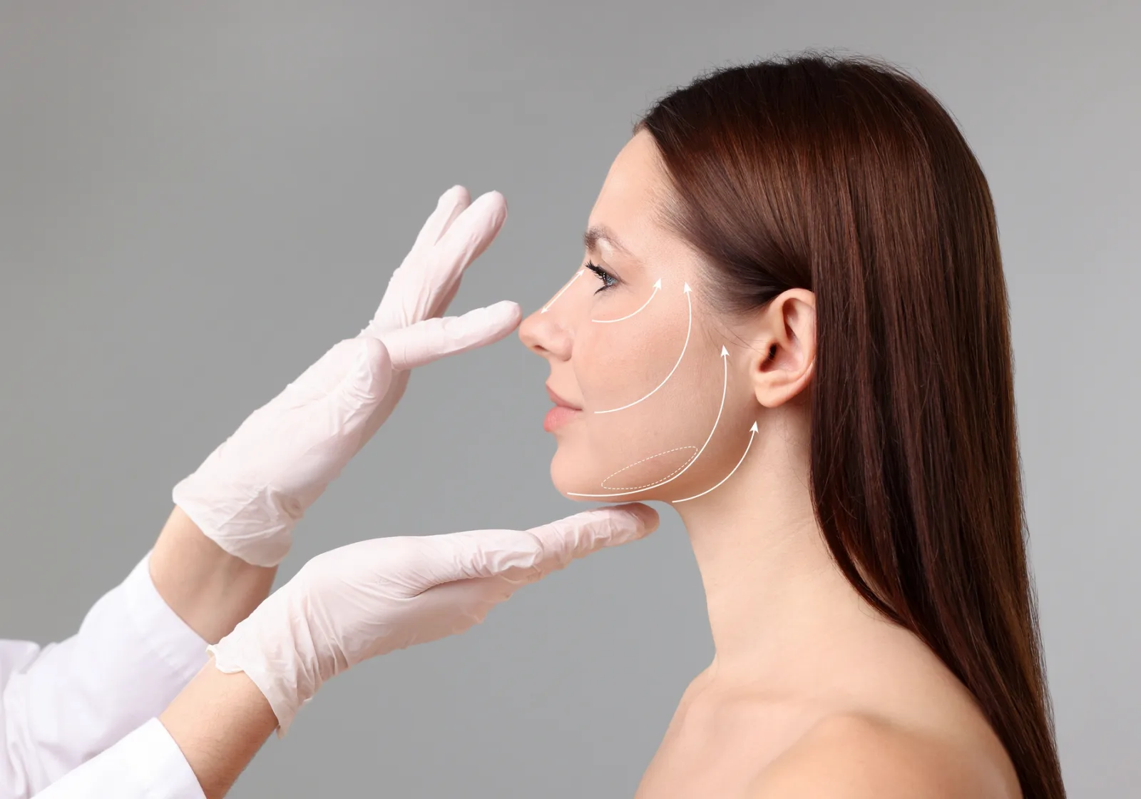Aesthetic practitioner assessing a client's facial profile